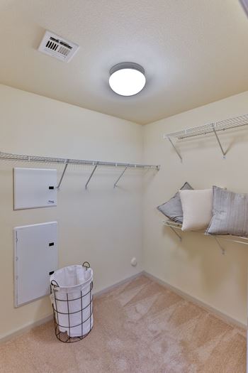 Large walk in closet with wire shelves